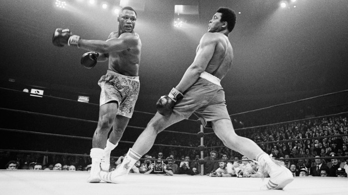Boxer Ali Dodging a Punch From Frazier